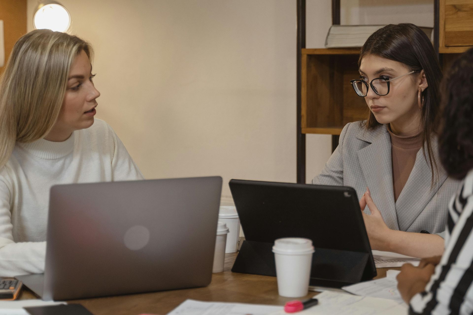 Women Having a Conversation With Laptop